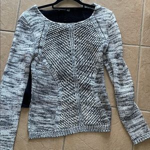 Sweater with a sheer back.